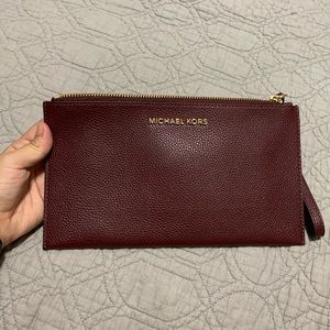 Michael Kors deep purple wrist wallet/clutch